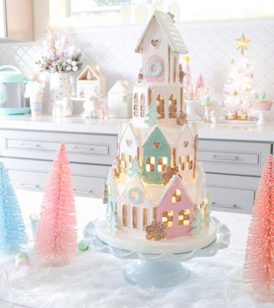 Close up of gingerbread village decor lit up.