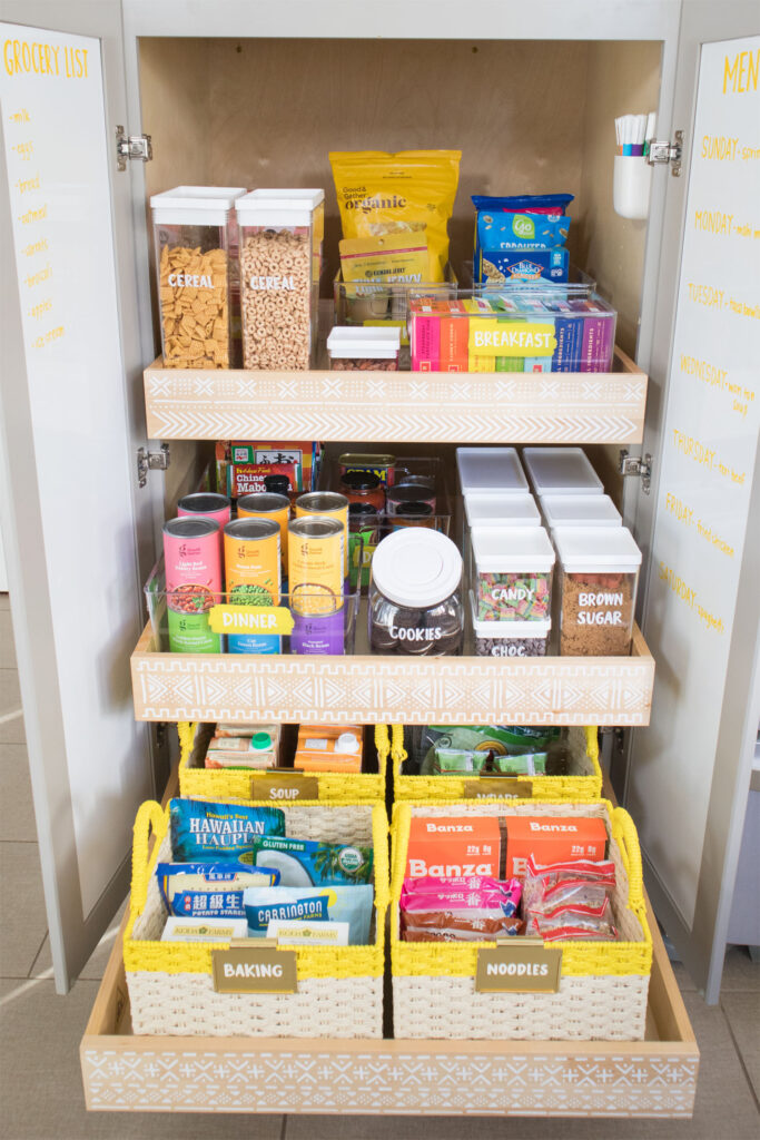 The "after" view of the bottom pantry cabinet with drawers pulled out.