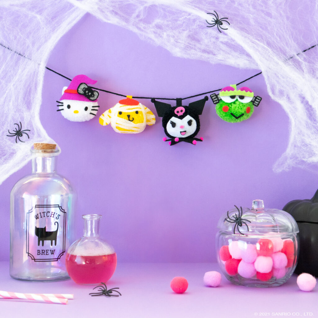 Sanrio Halloween DIY Pom Pom Garland featuring Hello Kitty, Pompompurin, Kuromi, and Keroppi